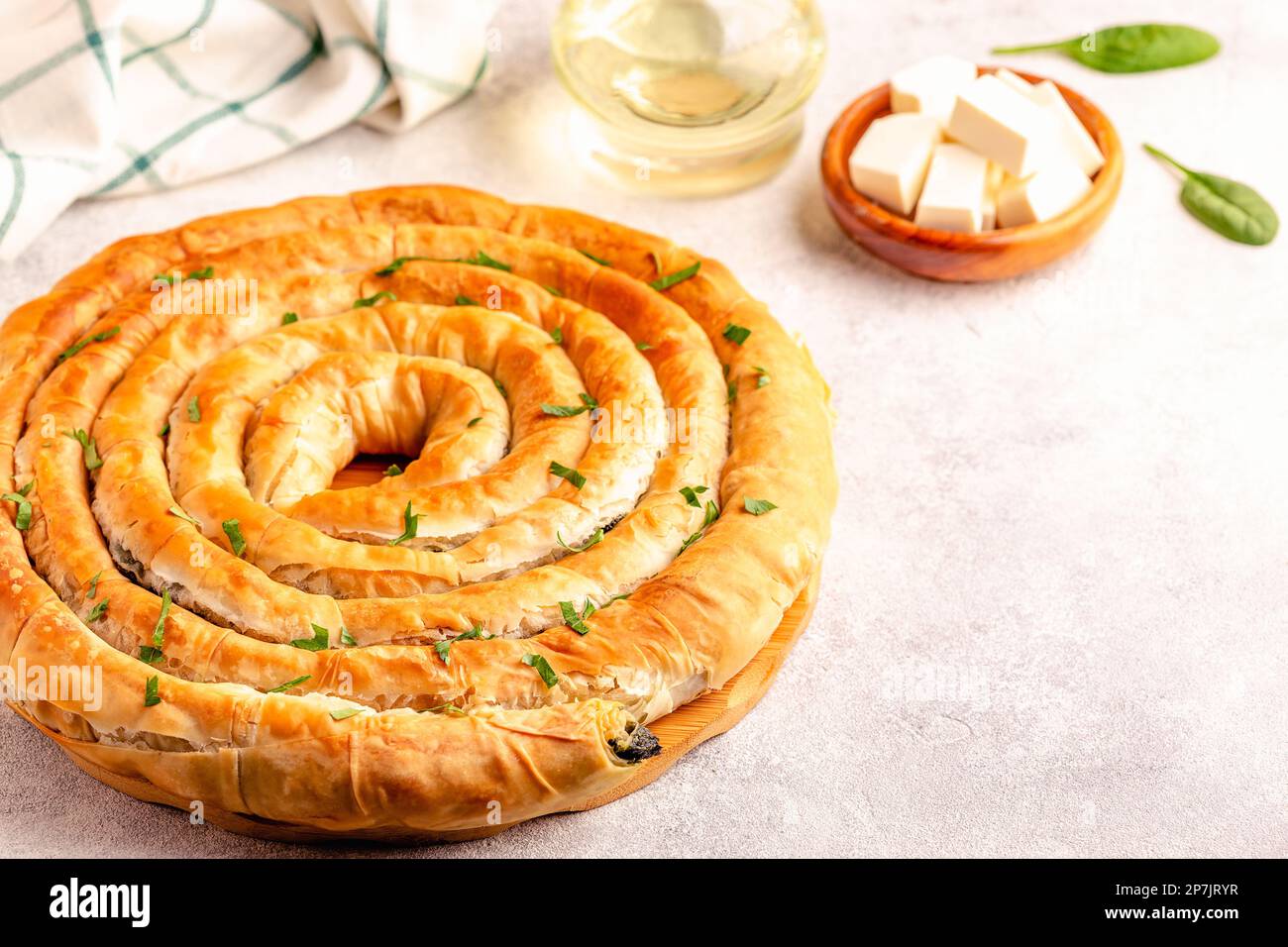 Spanakopita, greek phyllo pastry pie with spinach and feta cheese filling Stock Photo