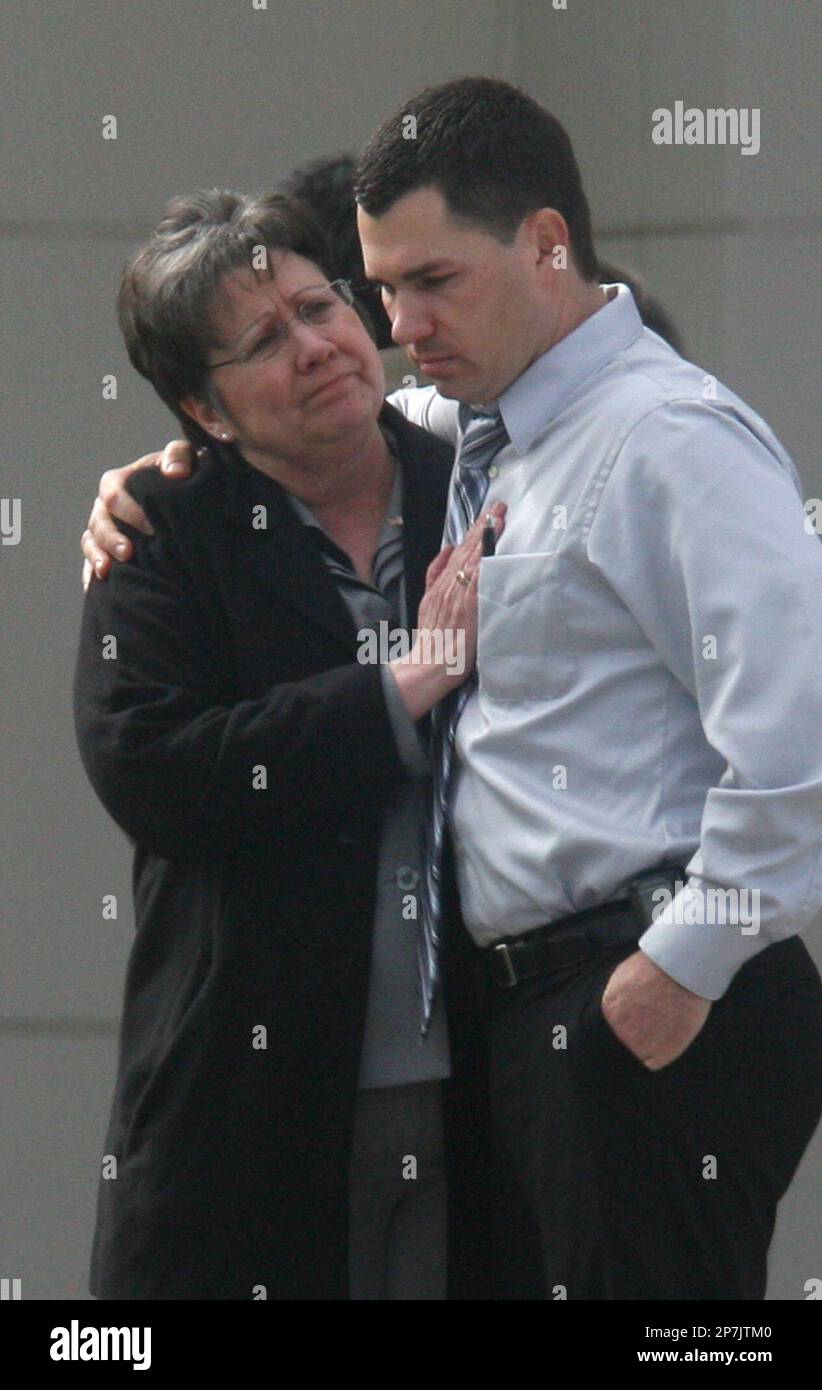 Fresno County Sheriff Margaret Mimms comforts a sheriff detective ...