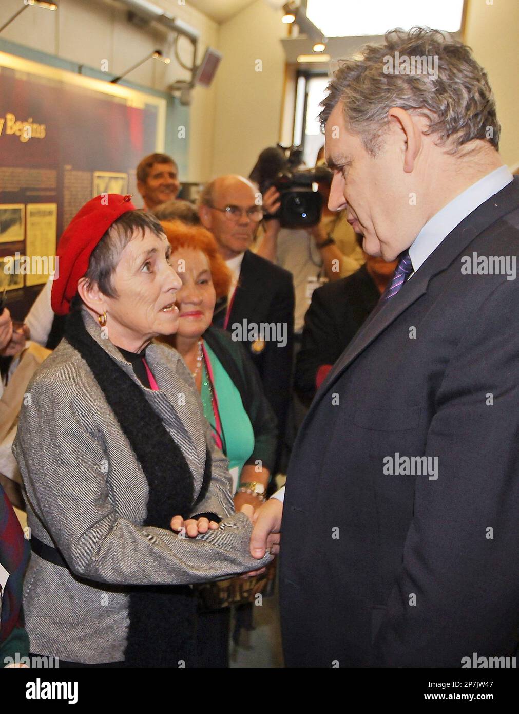 British Prime Minister Gordon Brown, right, meets with former child