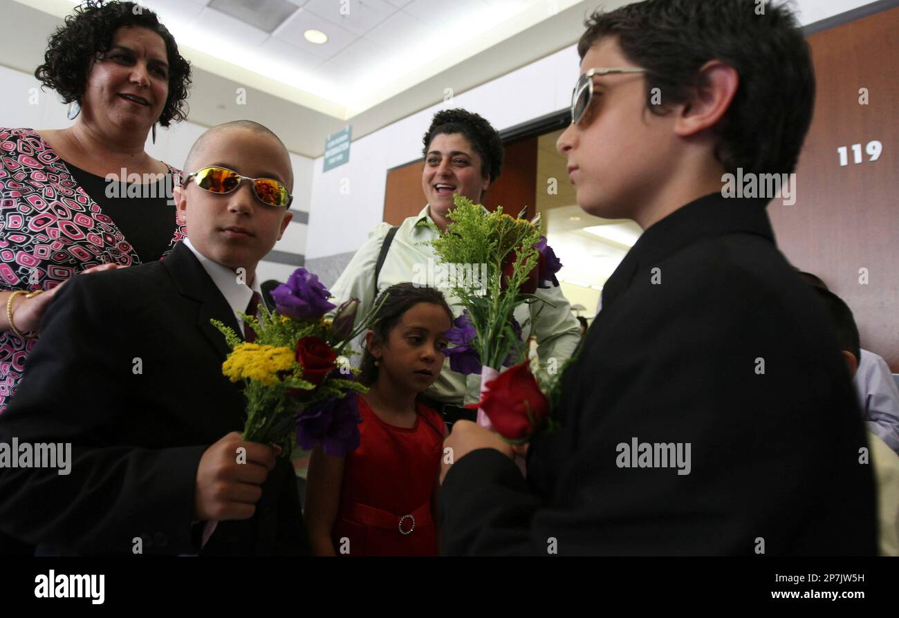 Omar, Hind and Hady join their moms Deanna and Huda Jadallah-Karraa, of  Oakland, as they wait to get married in Oakland, Calif. on Monday, June 17,  2008. The two have been together