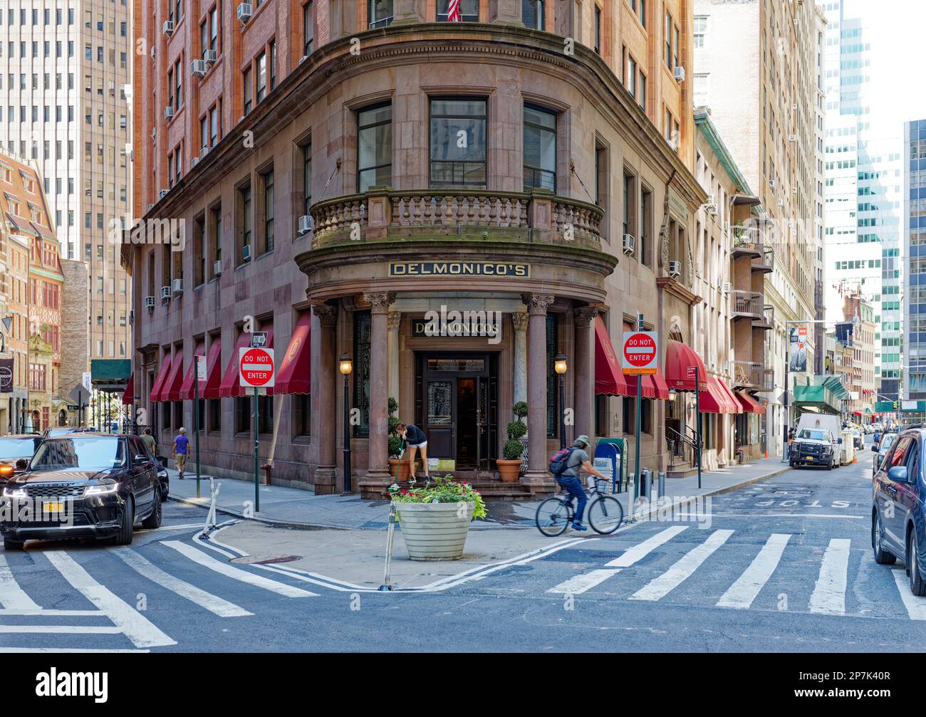 Delmonico’s restaurant occupies the base of this landmark brick, stone, and terra cotta building in the NYC Financial District. Stock Photo