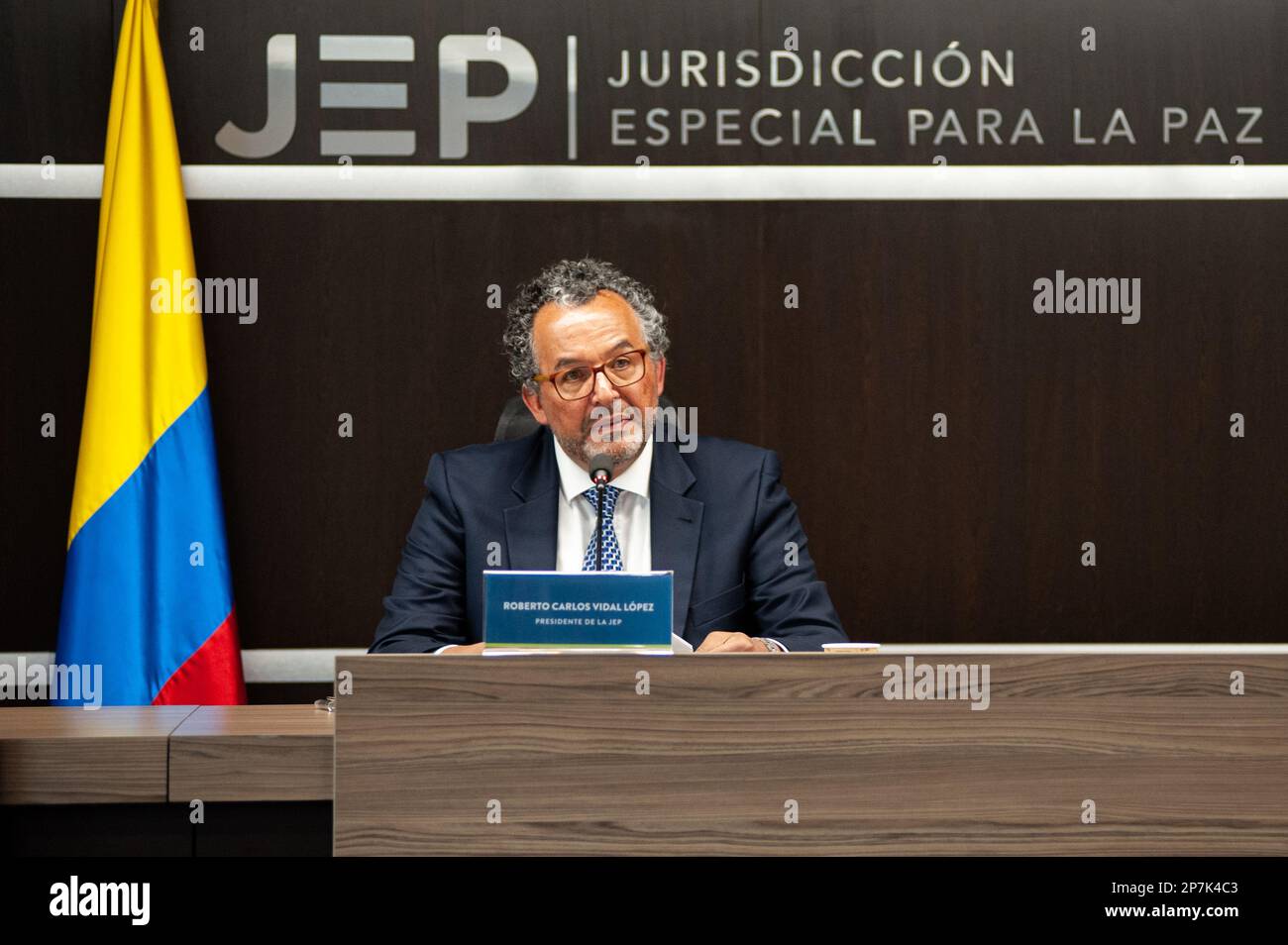 Magistrate and president of the Special Jurisdiction for Peace (JEP) Roberto Carlos Vidal Lopez speaks during a press conference about the denunciatio Stock Photo