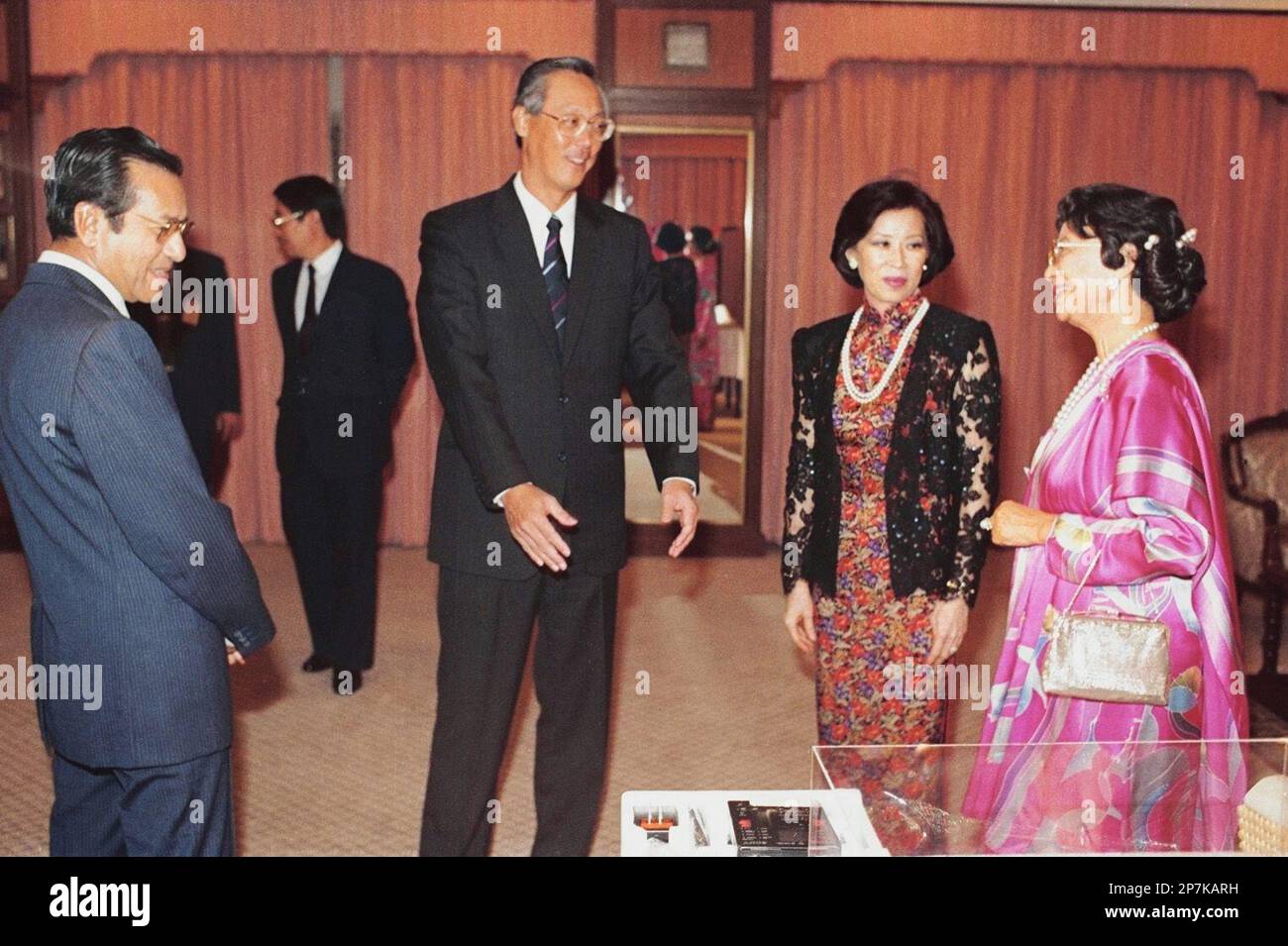 Singapore Prime Minister Goh Chok Tong (second from left), accompanied ...