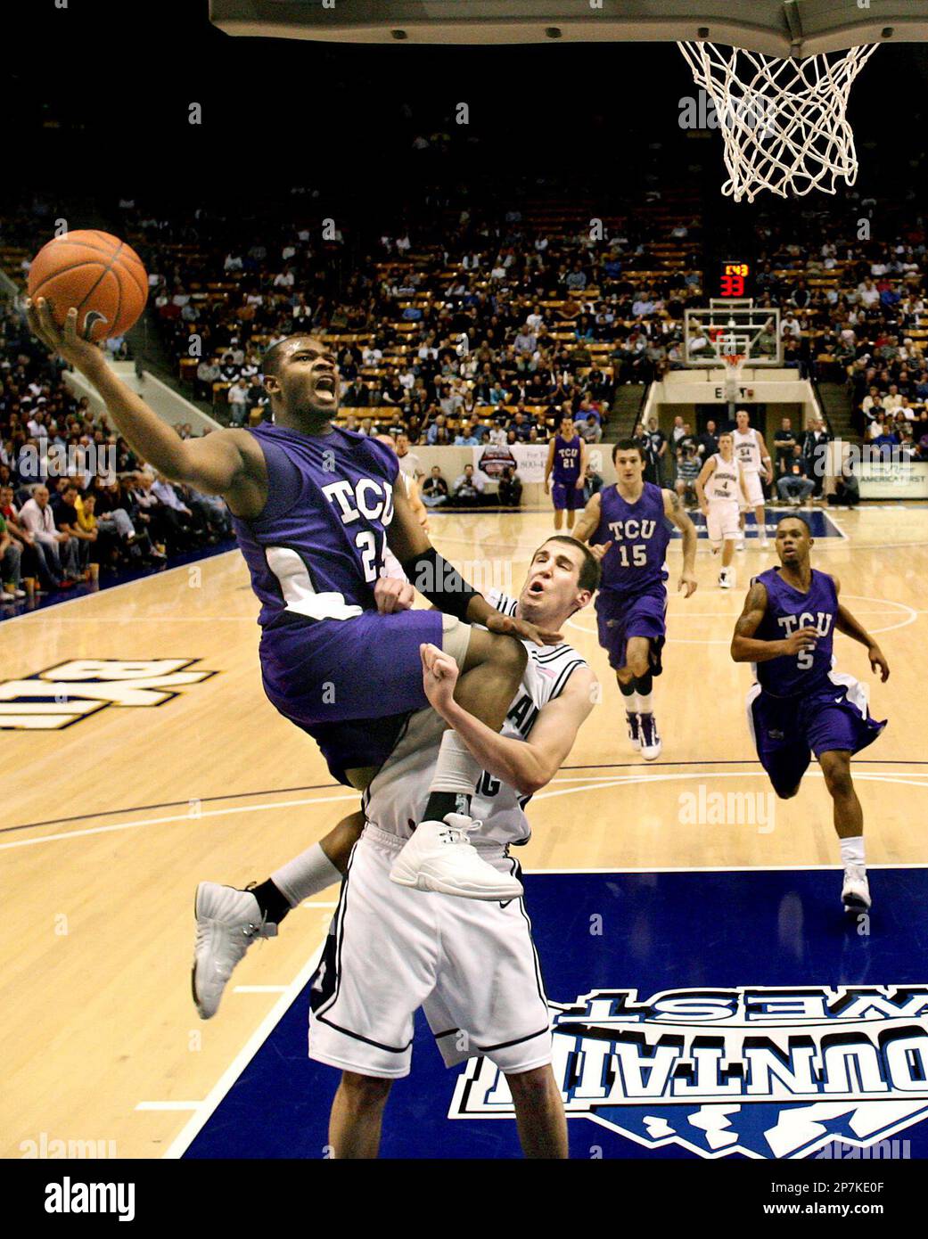 TCU Guard Greg Hill 25 Launches Over BYU Forward Noah Hartsock 34 