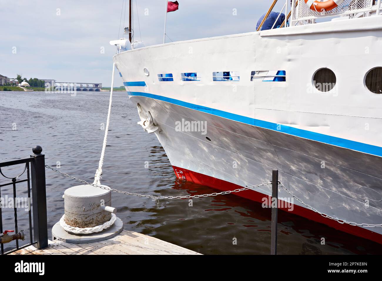 Mooring rope cruise ship on the river pier Stock Photo