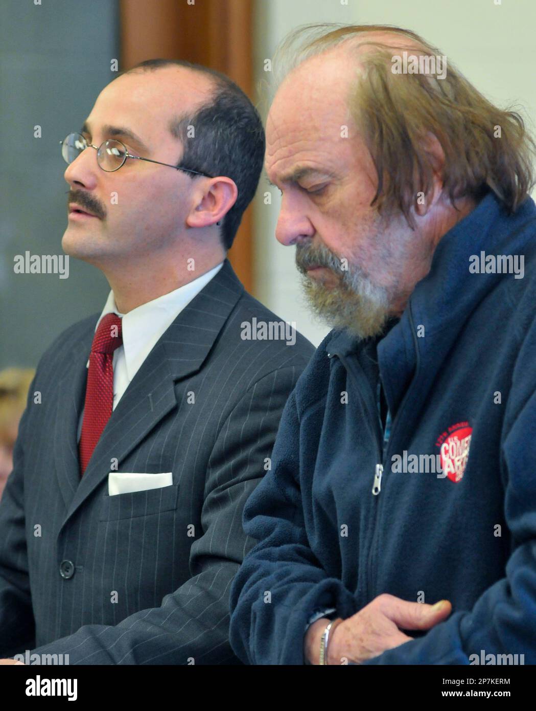 Actor Elmore "Rip" Torn, right appears with his attorney A. Thomas