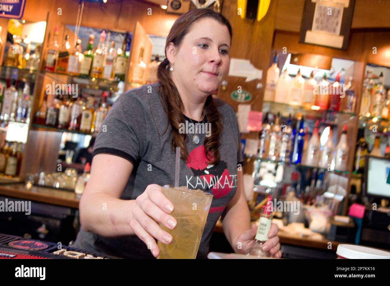 In this Jan. 25, 2010 photo, bartender Amber Dawn McCarrel serves a