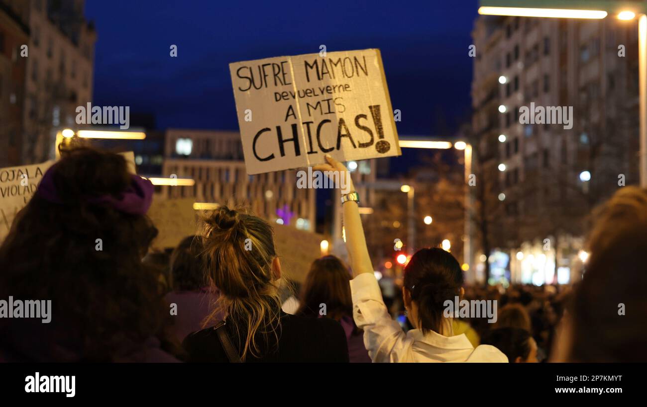 A woman protests with a sign during a demonstration called by the 8M ...