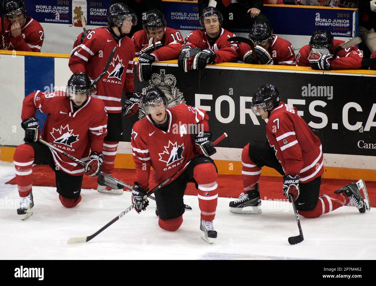 Canada players react after a 65 loss to the United States in overtime