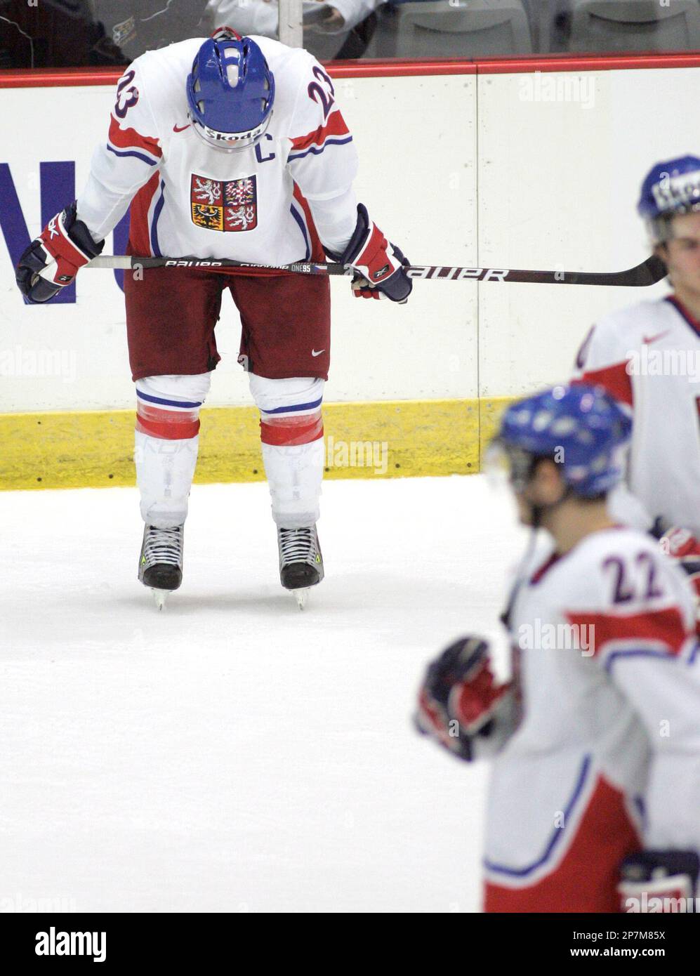 Czech Republic's Michal Jordan, left, hangs his head following the team