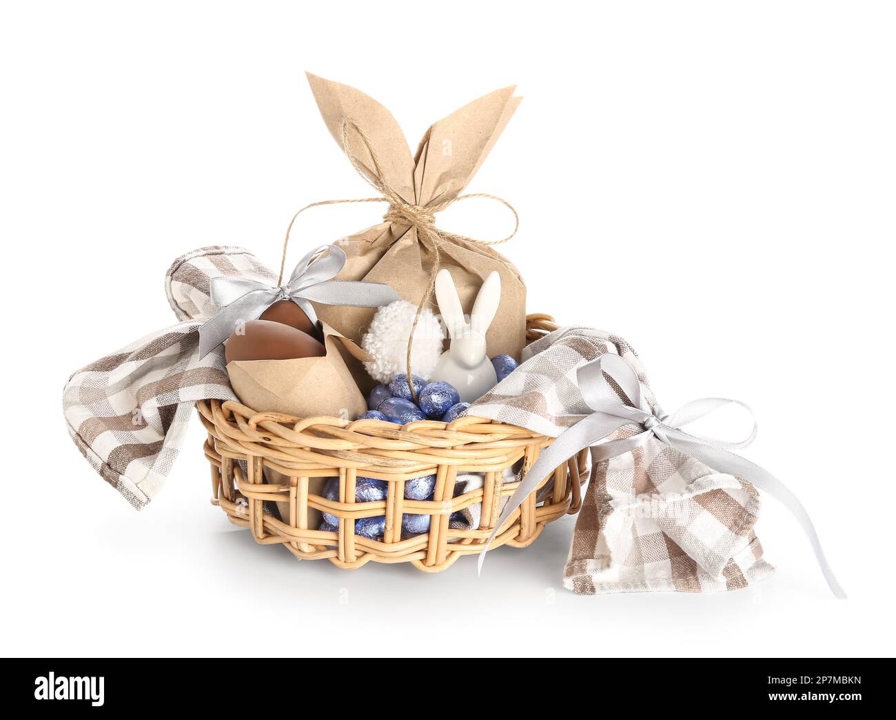 Basket with Easter eggs and bunny gift bag isolated on white background ...