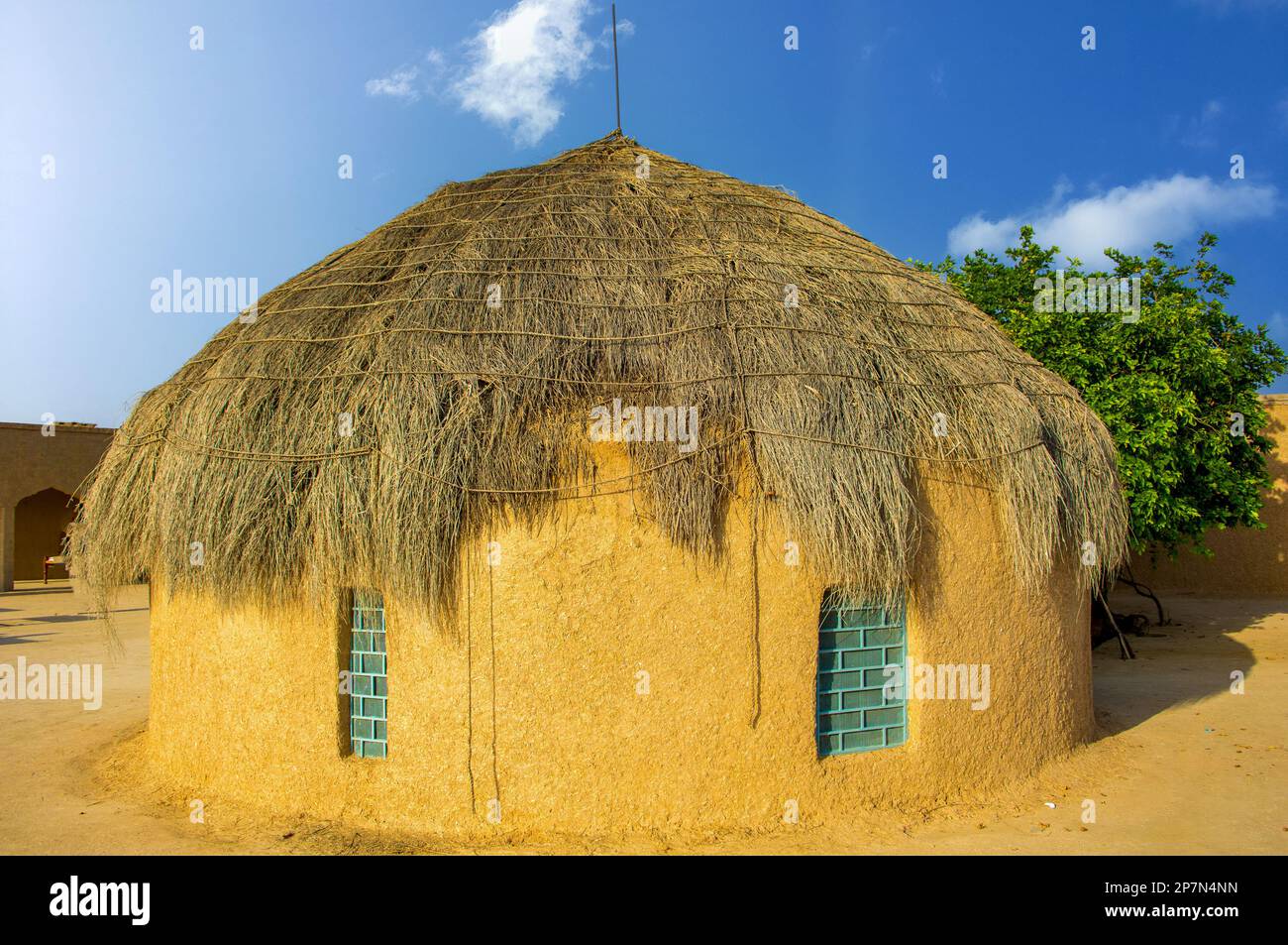 Mud hut house in the middle of the Thar desert Stock Photo