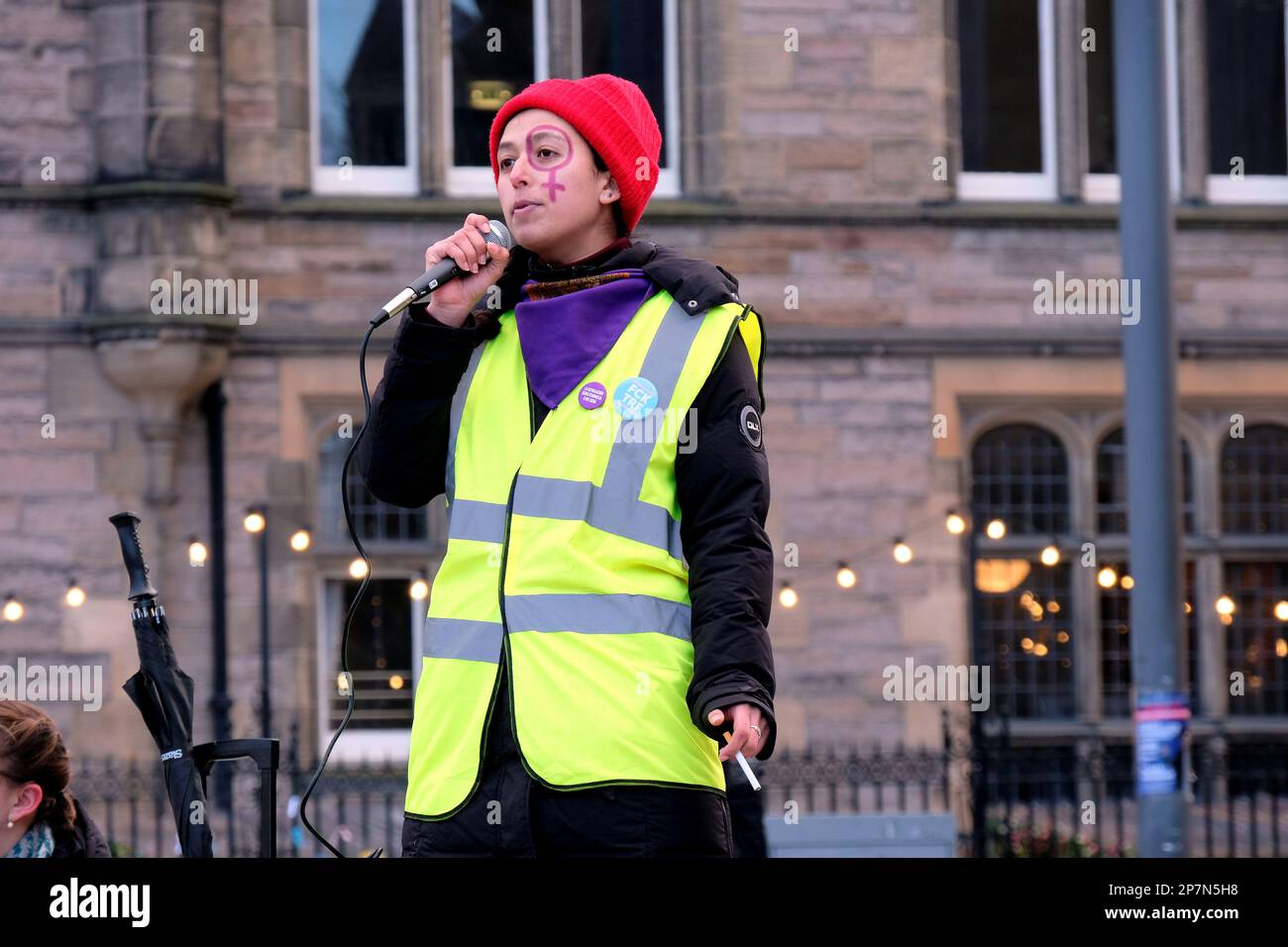 Edinburgh, Scotland, UK. 8th March 2023. Protest and activities for International Women's Day at Bristo Square, this year's theme is international and strike solidarity, with a focus on Iranian women's struggles. Speaker in Bristo Square. Credit: Craig Brown/Alamy Live News Stock Photo