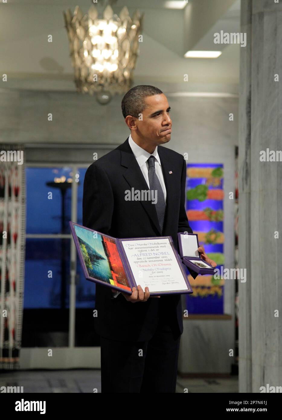 President And Nobel Peace Prize Laureate Barack Obama Poses With His president-and-nobel-peace-prize-laureate-barack-obama-poses-with-his