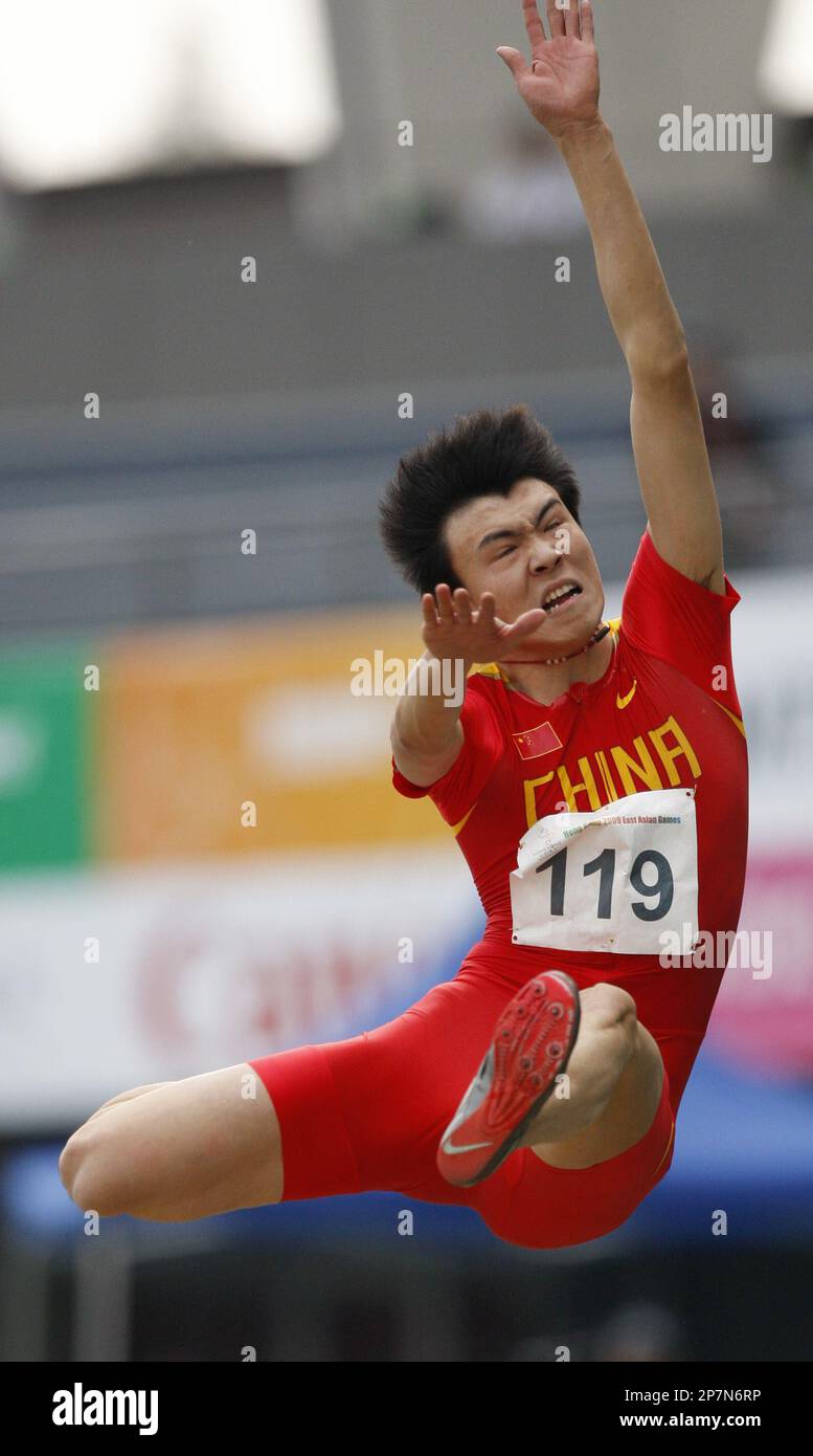 Li Jinzhe of China competes in the men's long jump final of the East