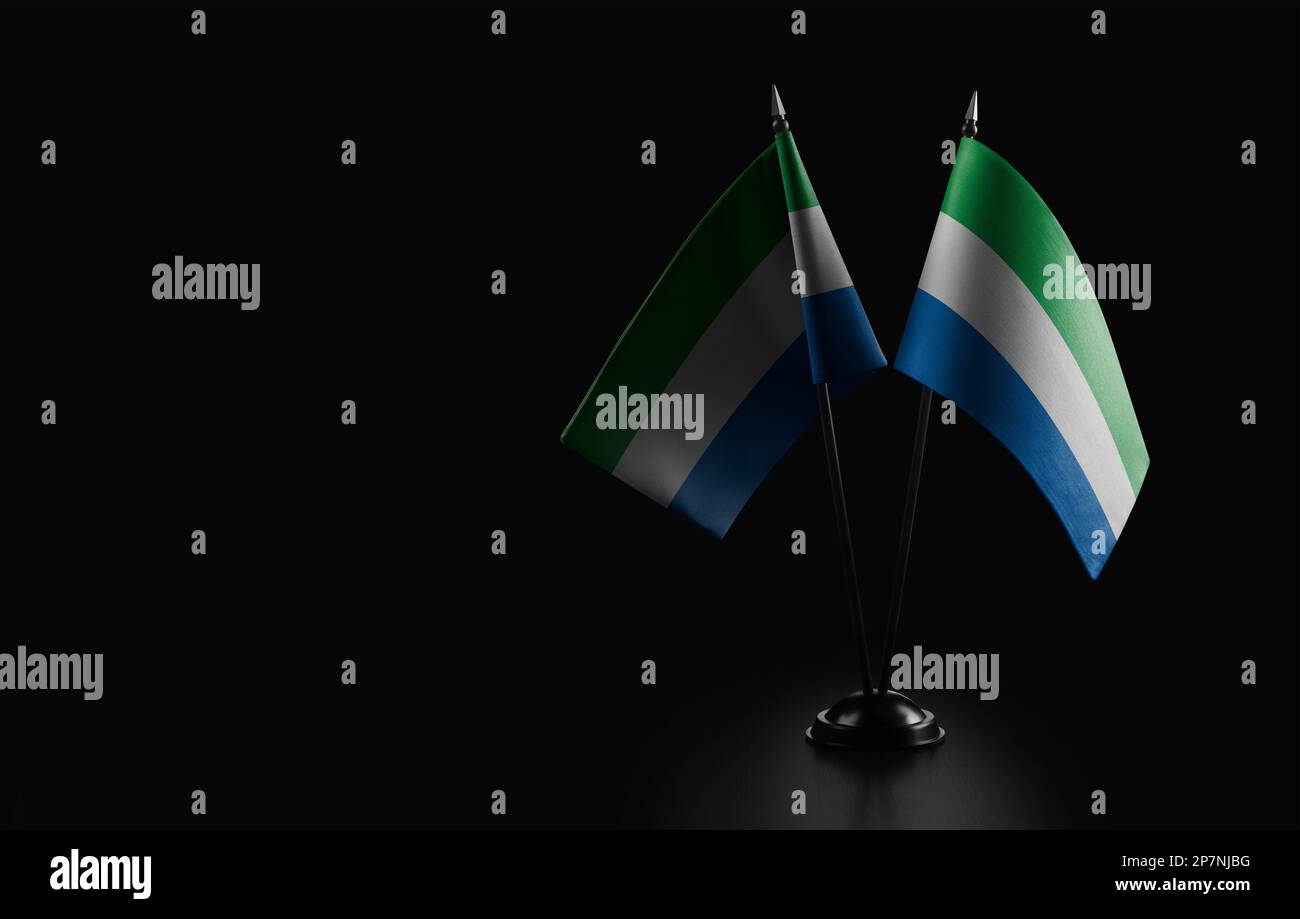 Small national flags of the Sierra Leone on a black background Stock ...