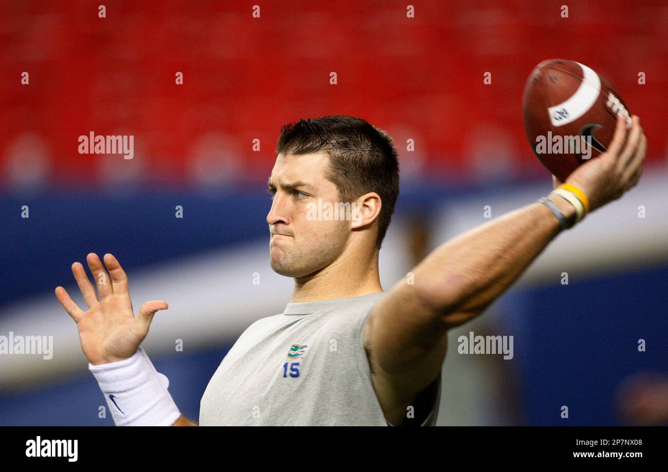 Florida quarterback Tim Tebow passes during practice in Atlanta, Friday ...