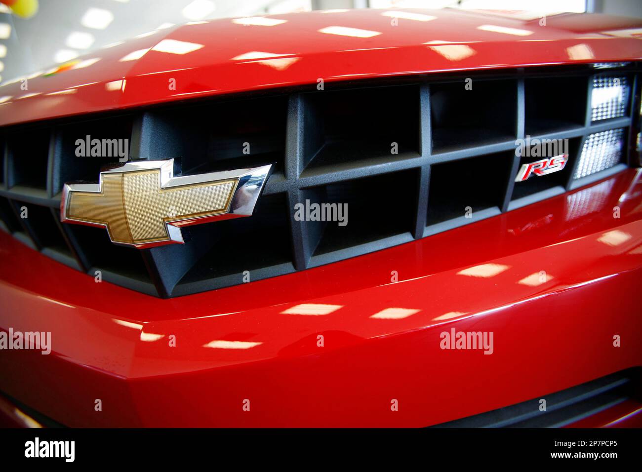 FILE In this May 15, 2009 file photo, a 2010 Chevy Camaro RS is shown on display inside the