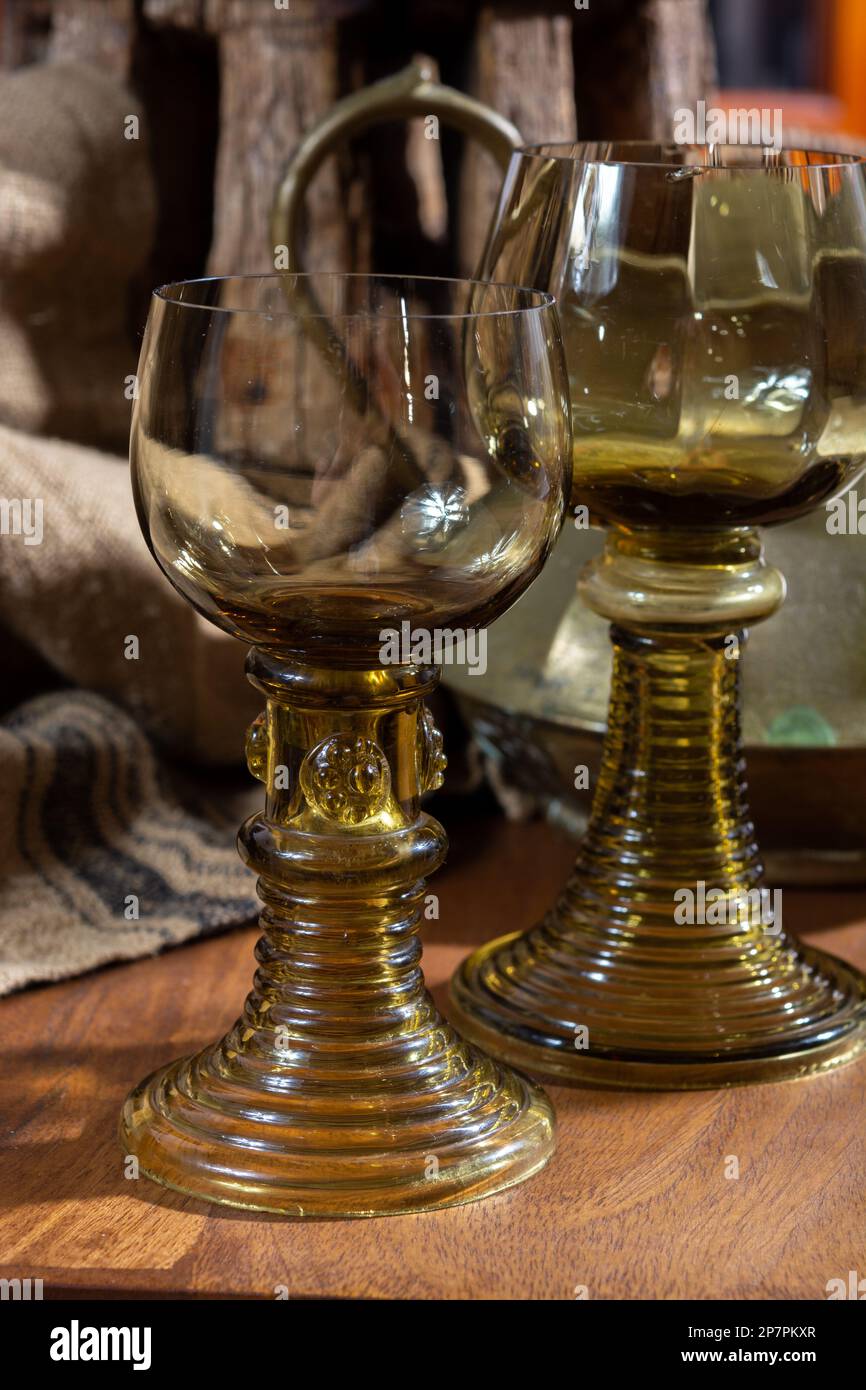 Emplty antique German glassware, old Dutch style rummer or roemer