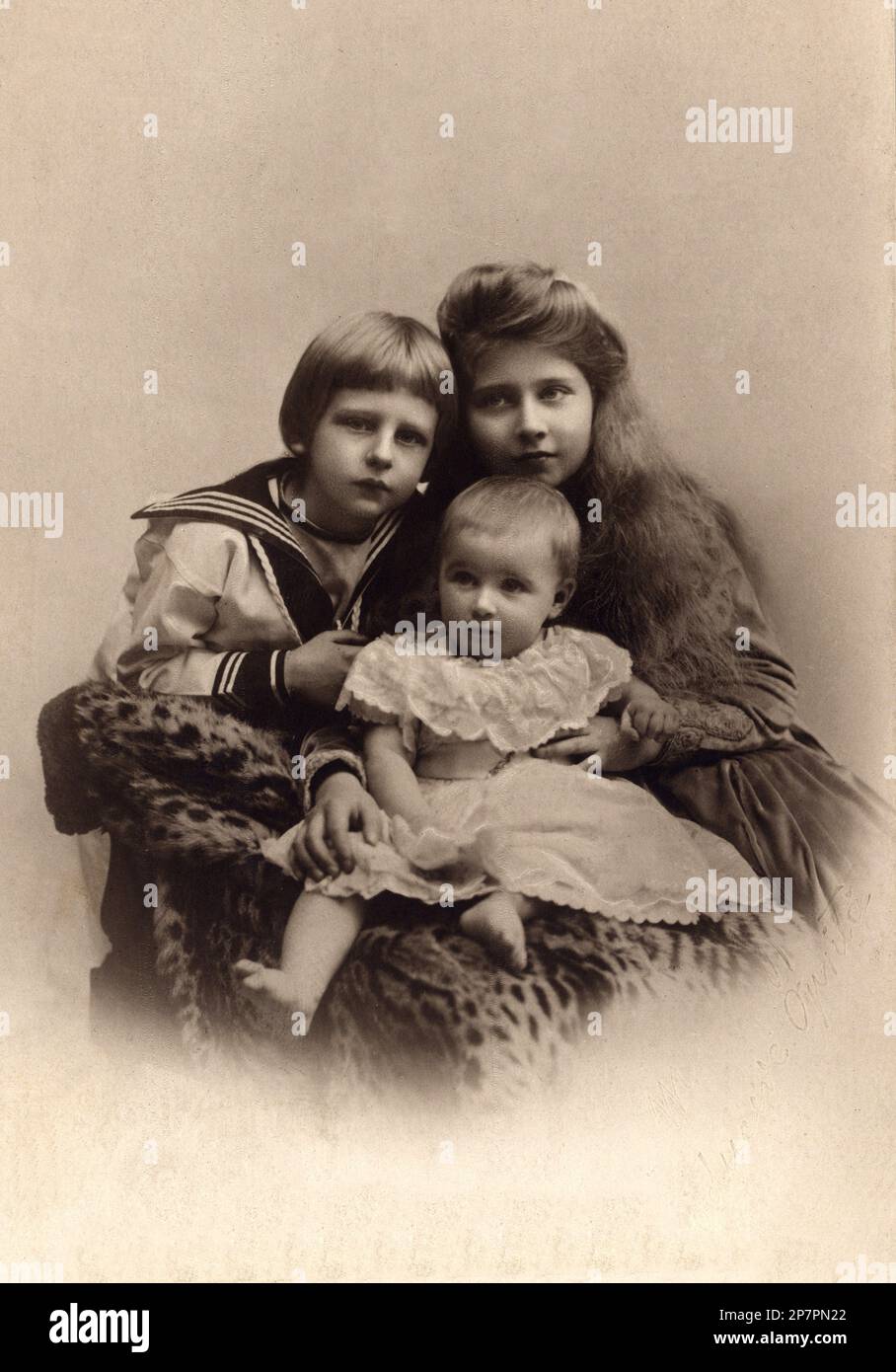 1910 c, ROMANIA : The prince NICOLAE von Hohenzollern Brana ( Nicky , Nicola , Nicholas , 1903 - 1978 ) , future Prince Regent of Romania from 1927 to 1930 ( at place of his nefew King Mihai - Michael son of his brother Carol II ), with young brothers : MARIA ( Mignon , 1900 - 1978 , married with King of Yugoslavia Aleksandar I ) and ILEANA ( Jleana , 1909 - 1991,  in 1931,  married the Habsburg of Tuscany Archduke Anton of Austria 1909 - 1991 ). Sons of King FERDINAND I ( Nando ) ( 1865 - 1927 ), King from 1914 to 1927, married with  Queen MARIA ( Mary ) of Romania princess of Great Britain a Stock Photo