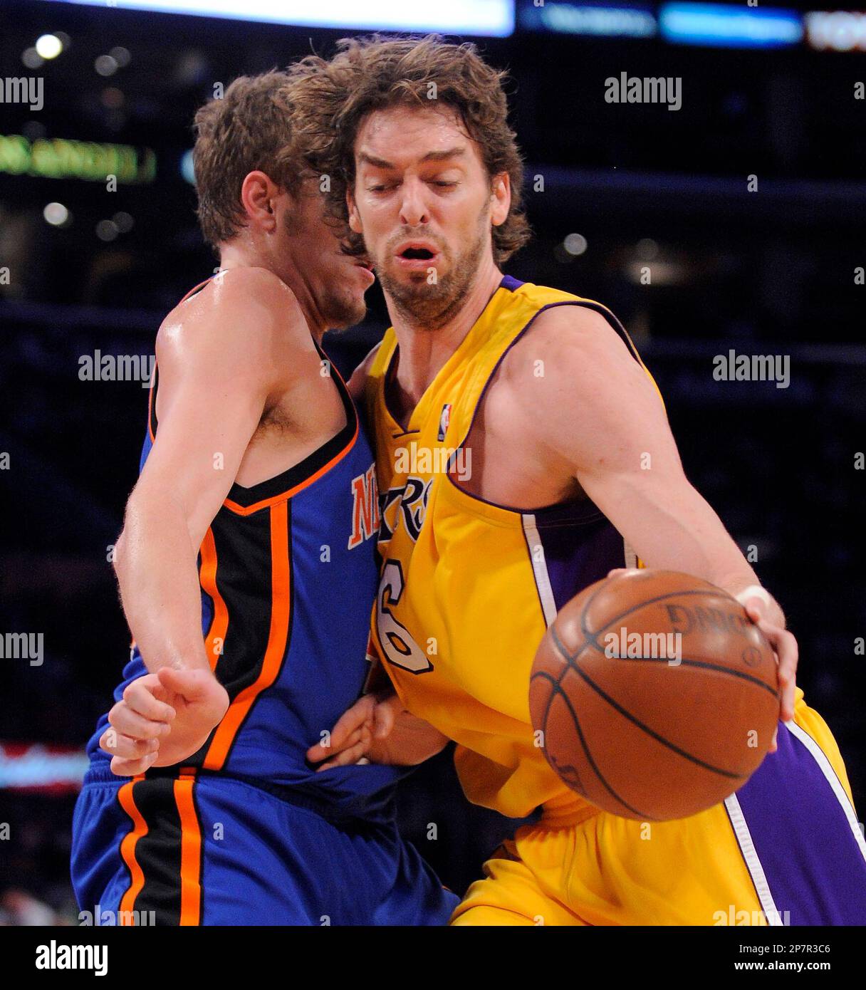 Los Angeles Lakers center Pau Gasol, right, drives around New