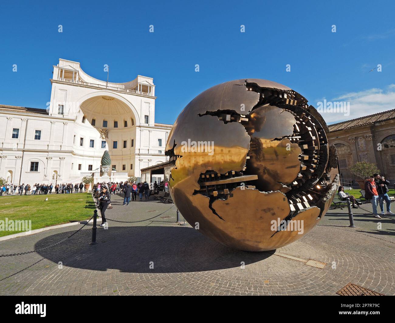 Sfera con sfera, Sphere within sphere, by Arnaldo Pomodoro, on the courtyard of the Vatican Museum in Vatican City. Stock Photo