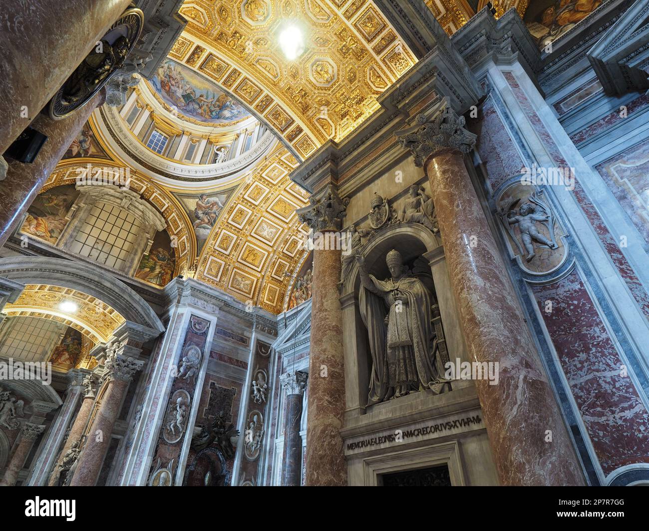 The interior decoration in Saint Peters Basilica, together with the sheer size, is mindblowing. Vatican City, Europe Stock Photo