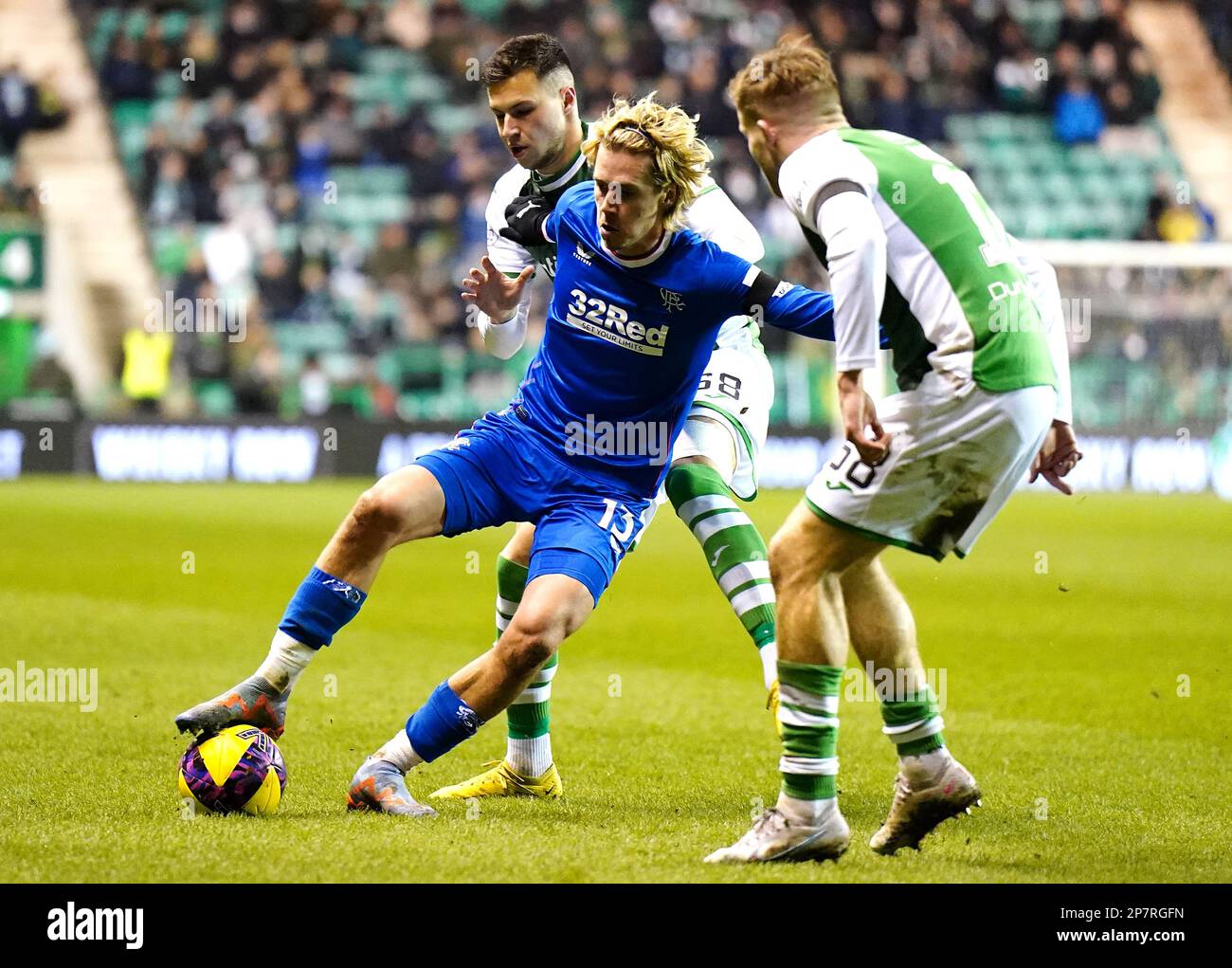 Rangers' Todd Cantwell (left) in action during the cinch Premiership match at Easter Road, Edinburgh. Picture date: Wednesday March 8, 2023. Stock Photo