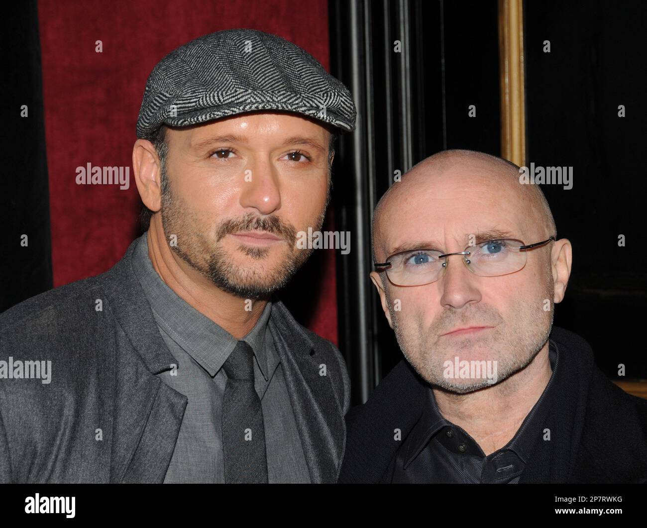 Actor Tim McGraw, left, and Phil Collins attend the Warner Bros