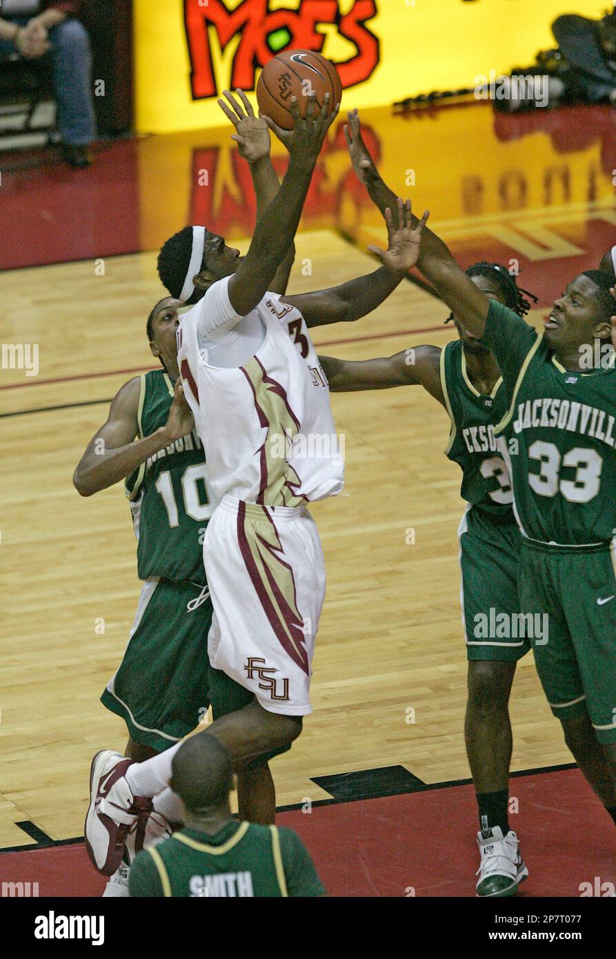 Florida State's Chris Singleton shoots over the defense of Jacksonville