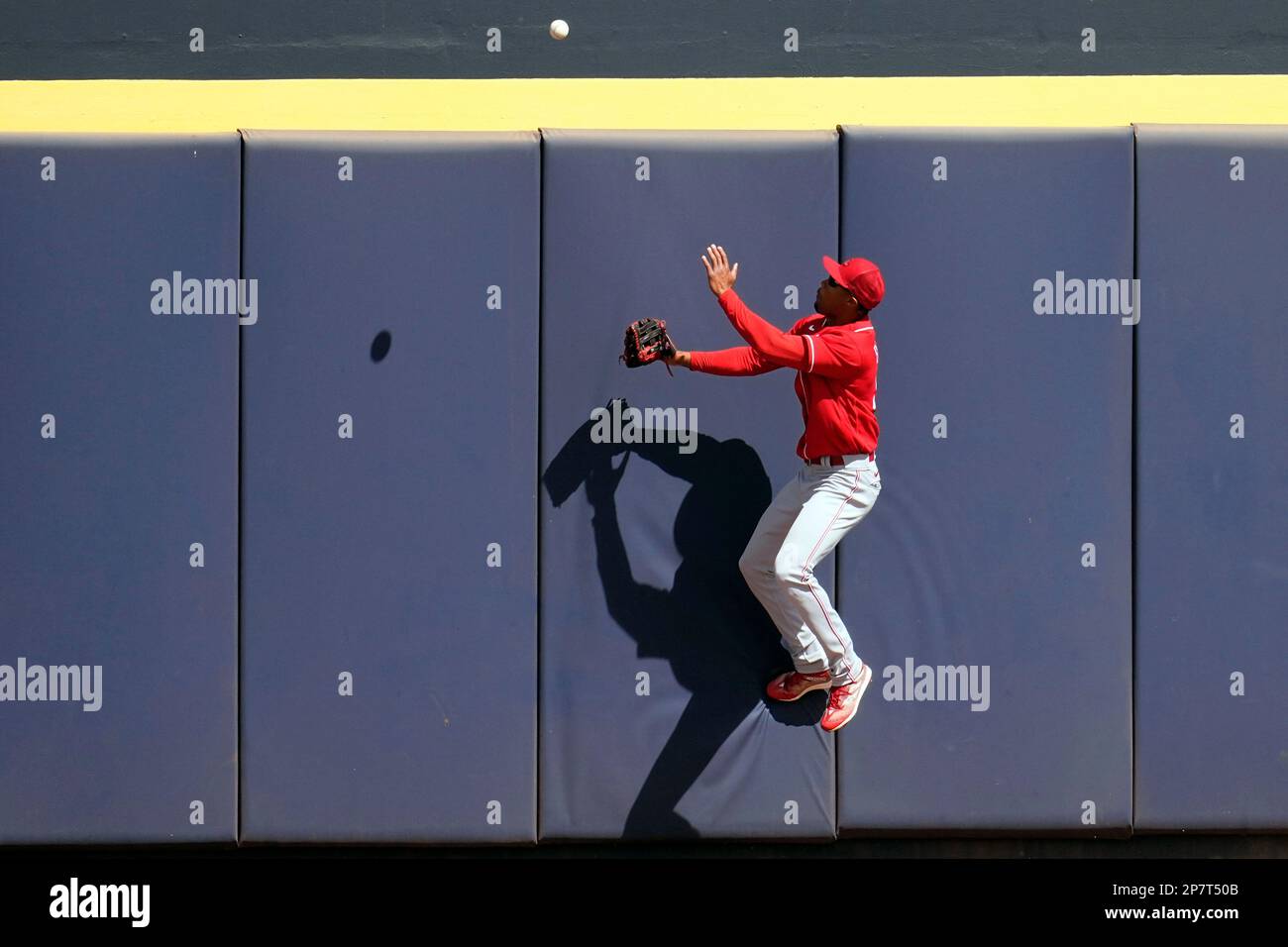 San Diego Padres' Alfonso Rivas advances from second base before being  tagged out at third off a fielder's choice by Fernando Tatis Jr. during the  fourth inning of a baseball game against