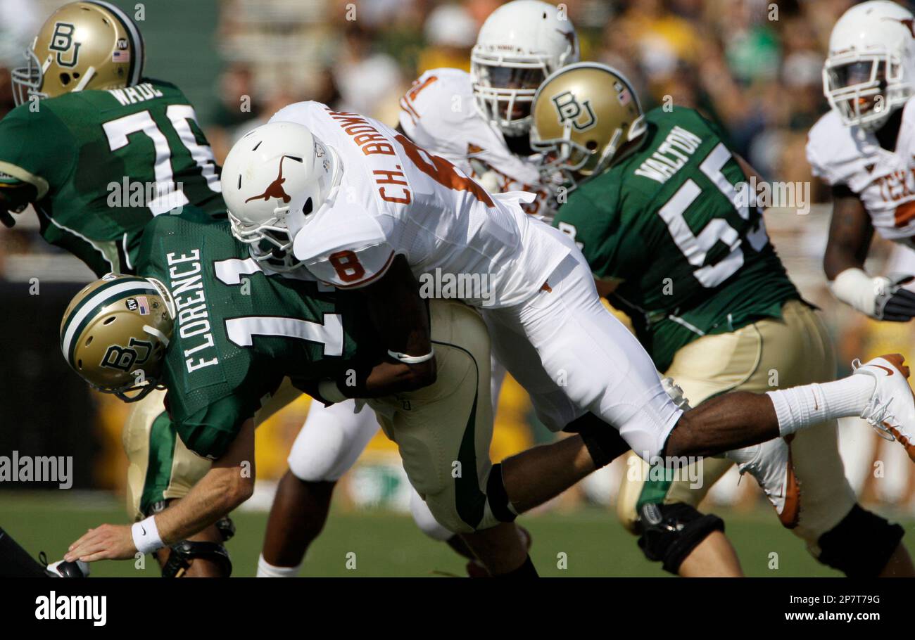 Texas Cornerbacks Texas cornerback Chykie Brown (8) sacks Baylor quarterback Nick ...