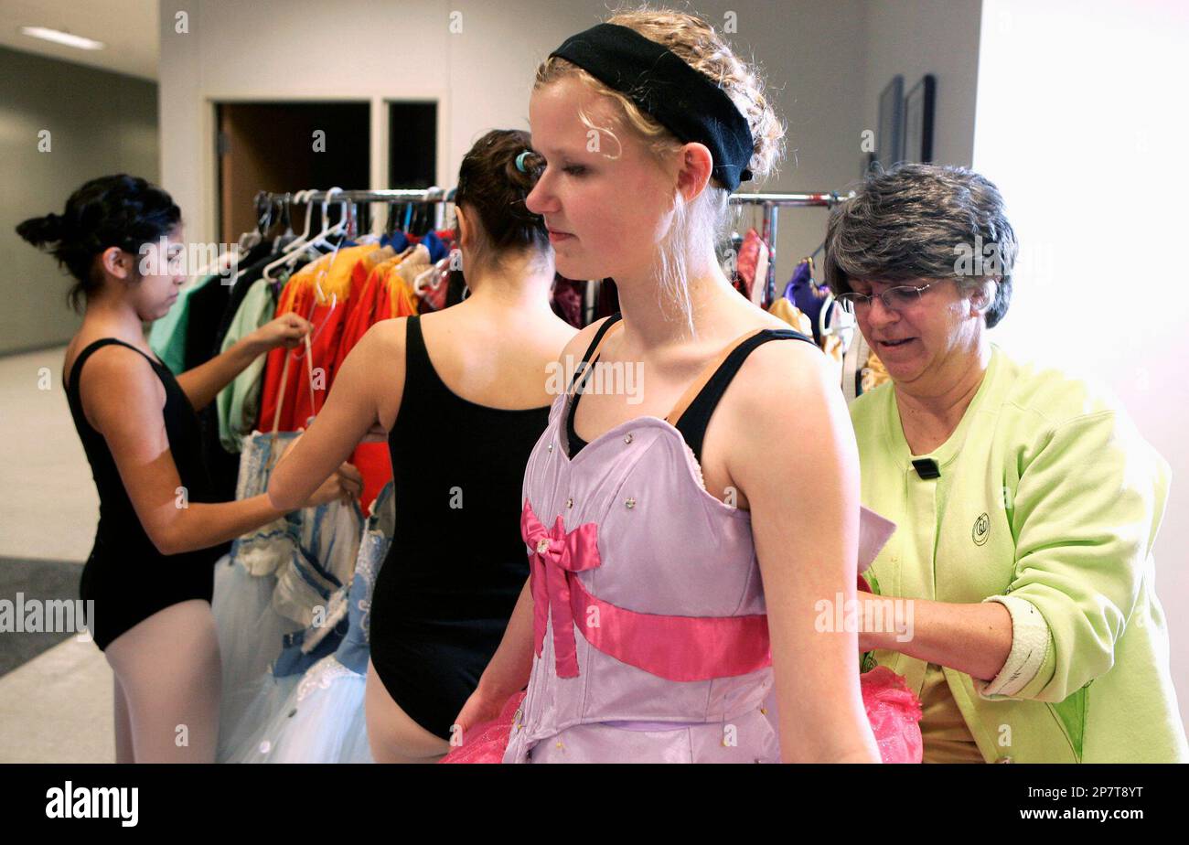 In this photo taken Nov. 2, 2009, volunteer costume coordinator Julie