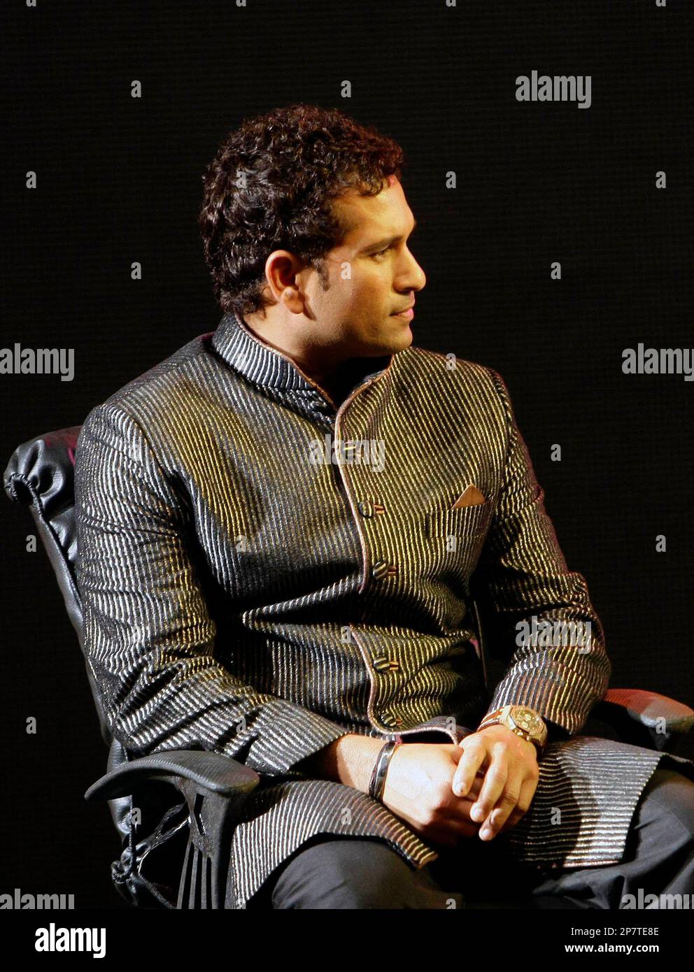 Indian cricket player Sachin Tendulkar, looks on during a function to