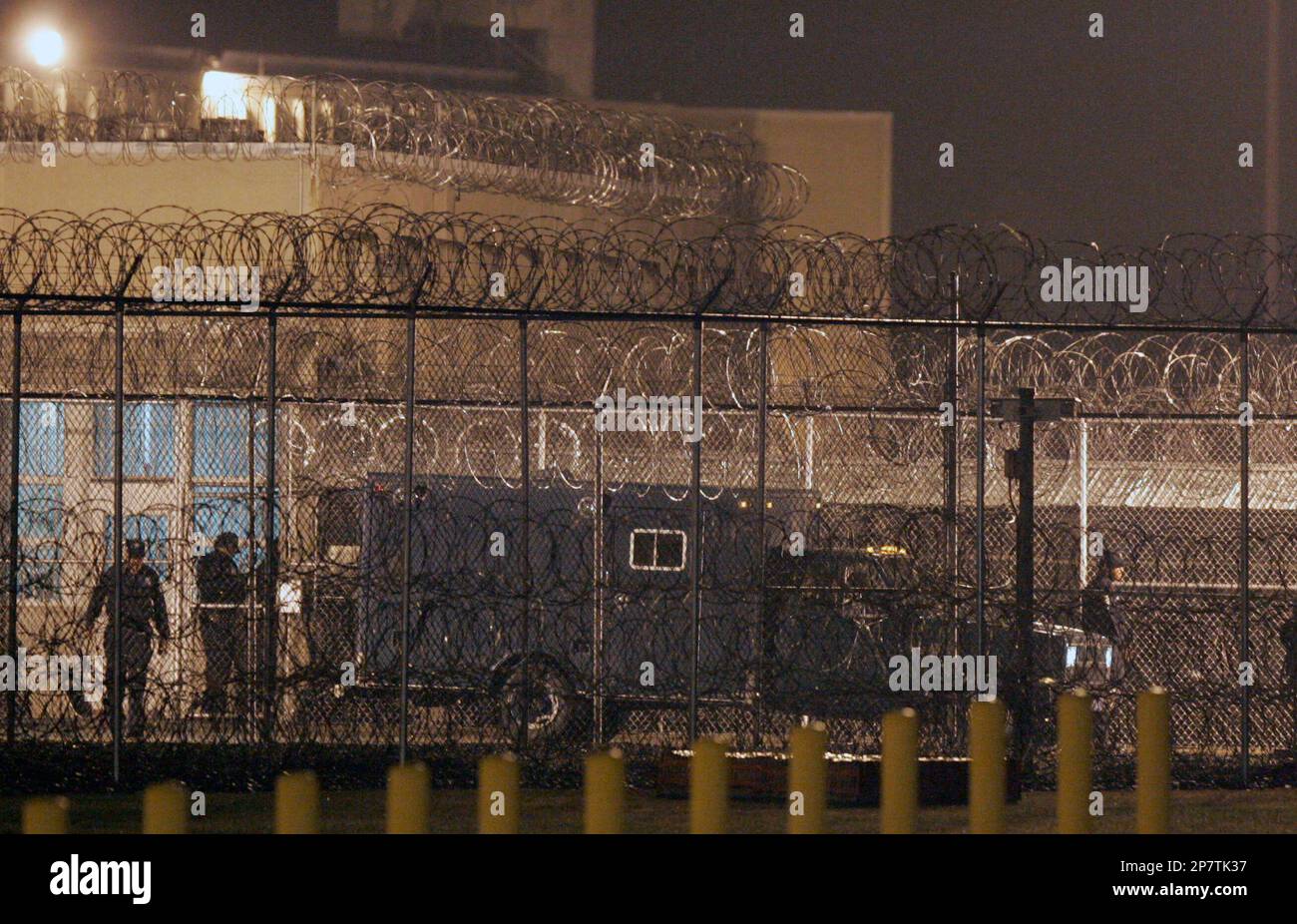 A state forensic van containing the body of convicted sniper John Allen