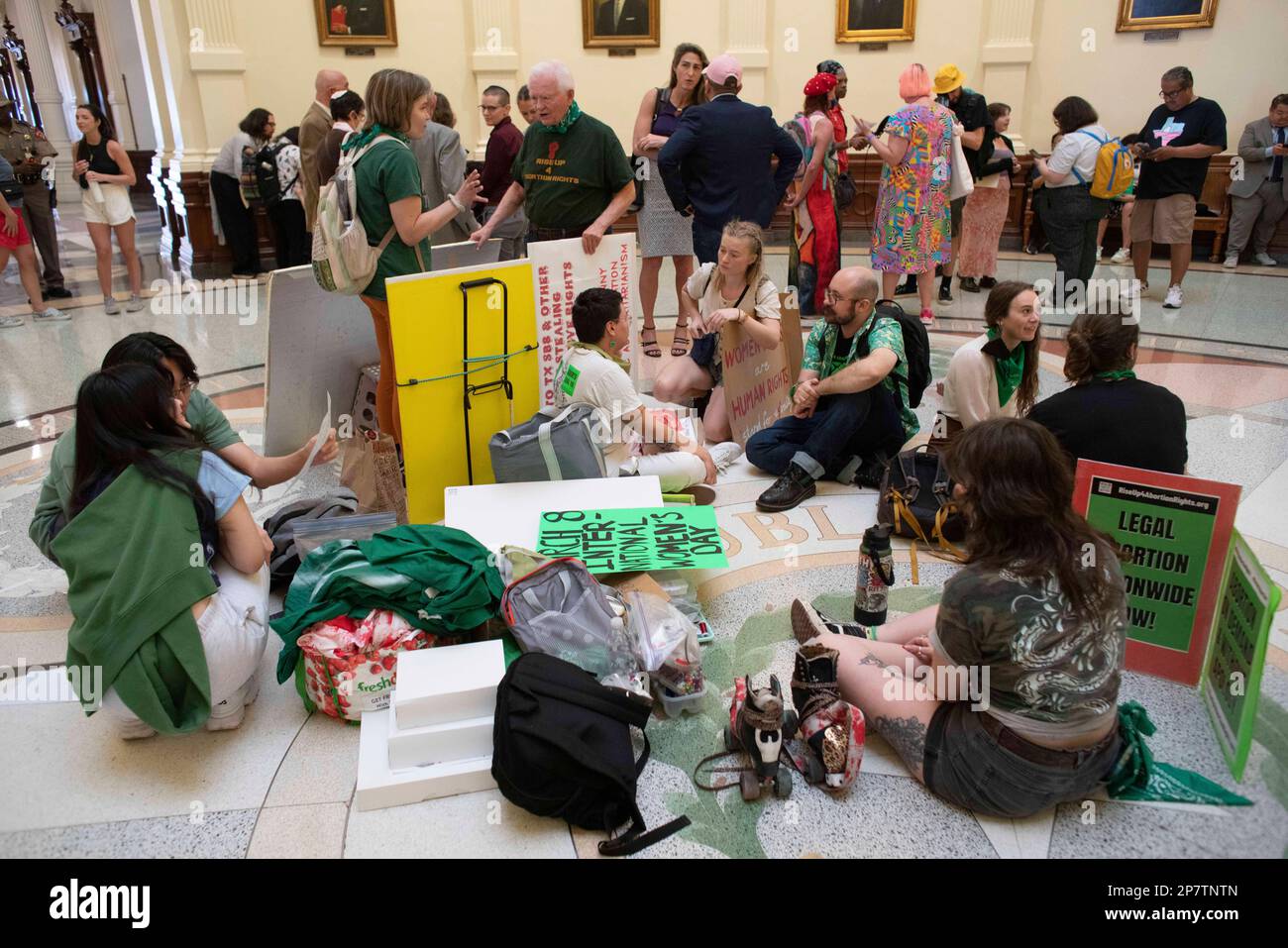 A group of men and women advocating for abortion rights participate in a sit-in in the Texas Capitol rotunda as part of an International Women's Day activity. Credit: Bob Daemmrich/Alamy Live News Stock Photo