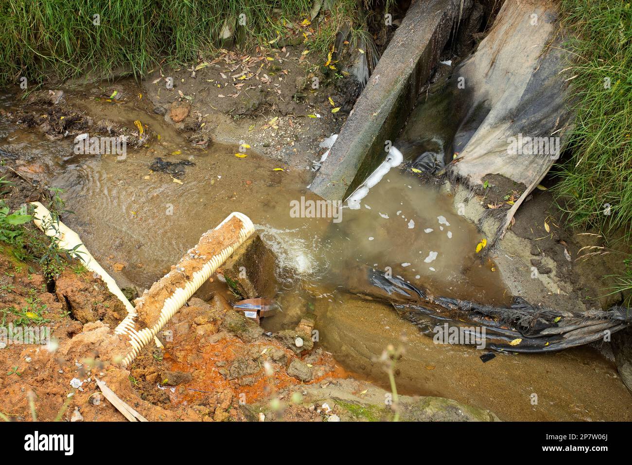 Municipal domestic wastewater exiting the creek Stock Photo