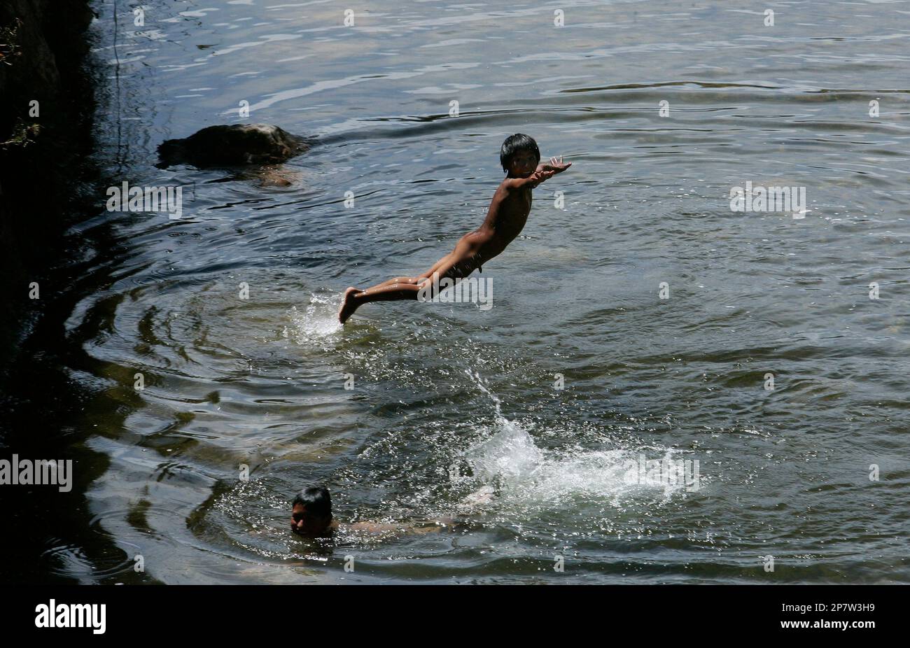 EDS NOTE NUDITY Children Swim In A River In Chupaca Central Peru eds-note-nudity-children-swim-in-a-river-in-chupaca-central-peru