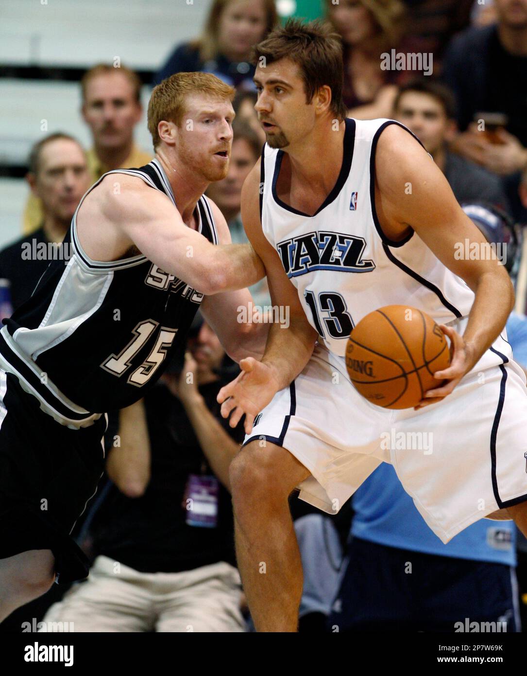 Utah Jazz forward Mehmet Okur (13), of Turkey, works the ball down low