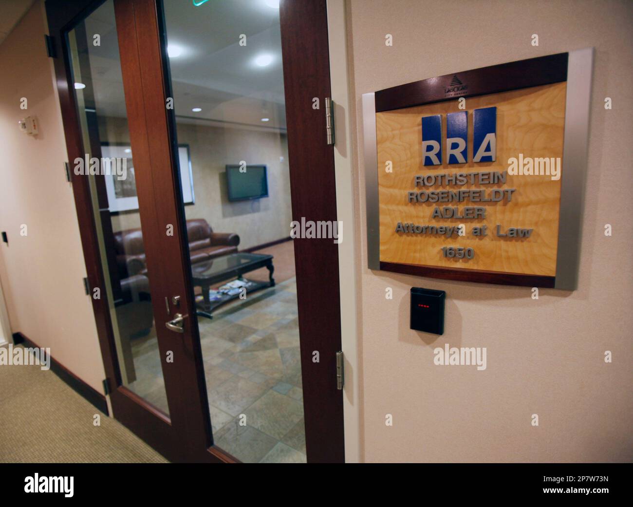 The door to the law offices of Rothstein Rosenfeldt Adler, are shown ...