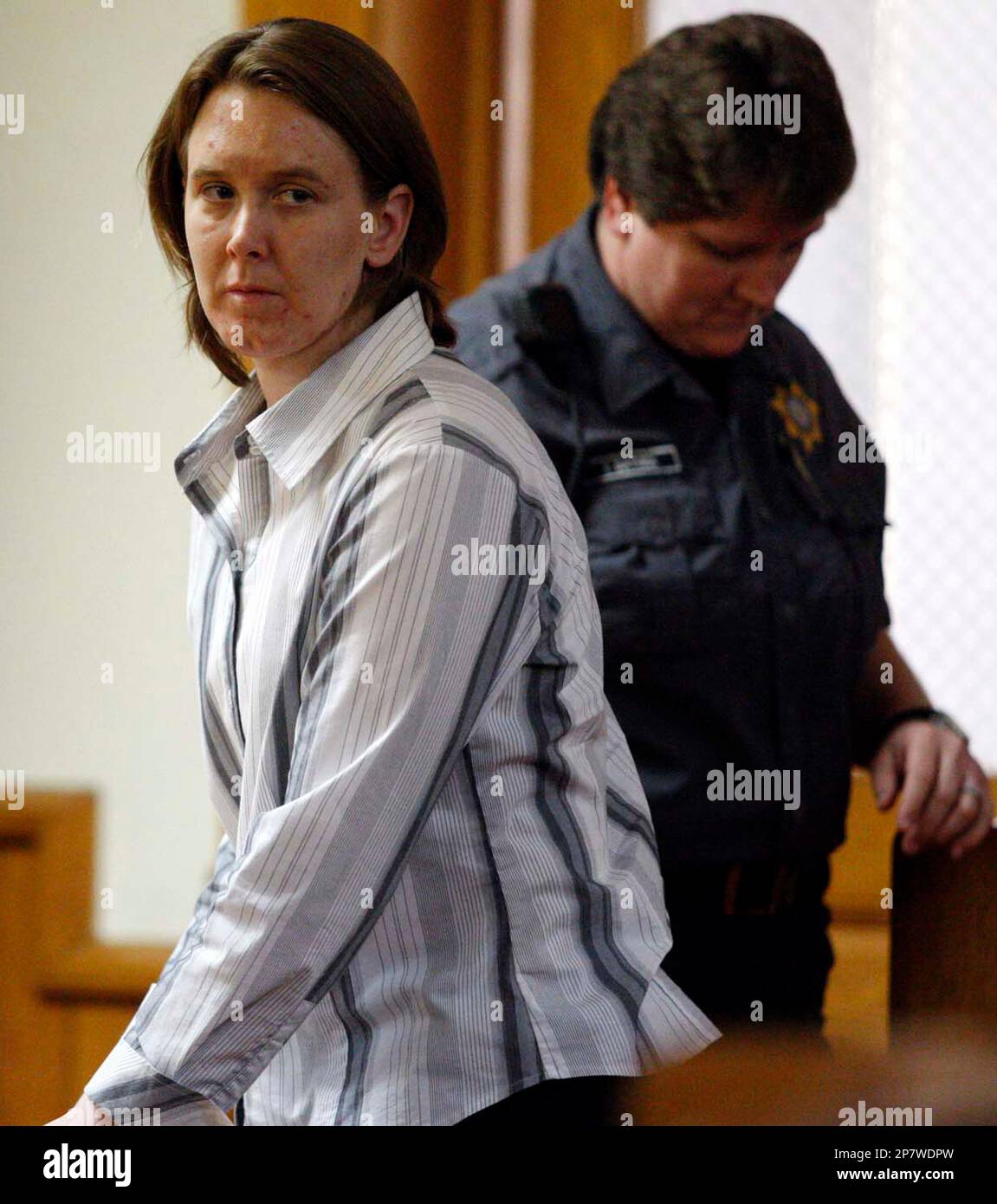 Michelle Kehoe enters the courtroom for the resumption of her murder