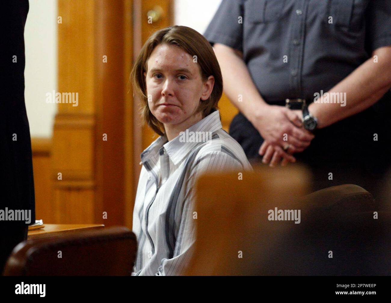 Michelle Kehoe looks toward family members at the resumption of her