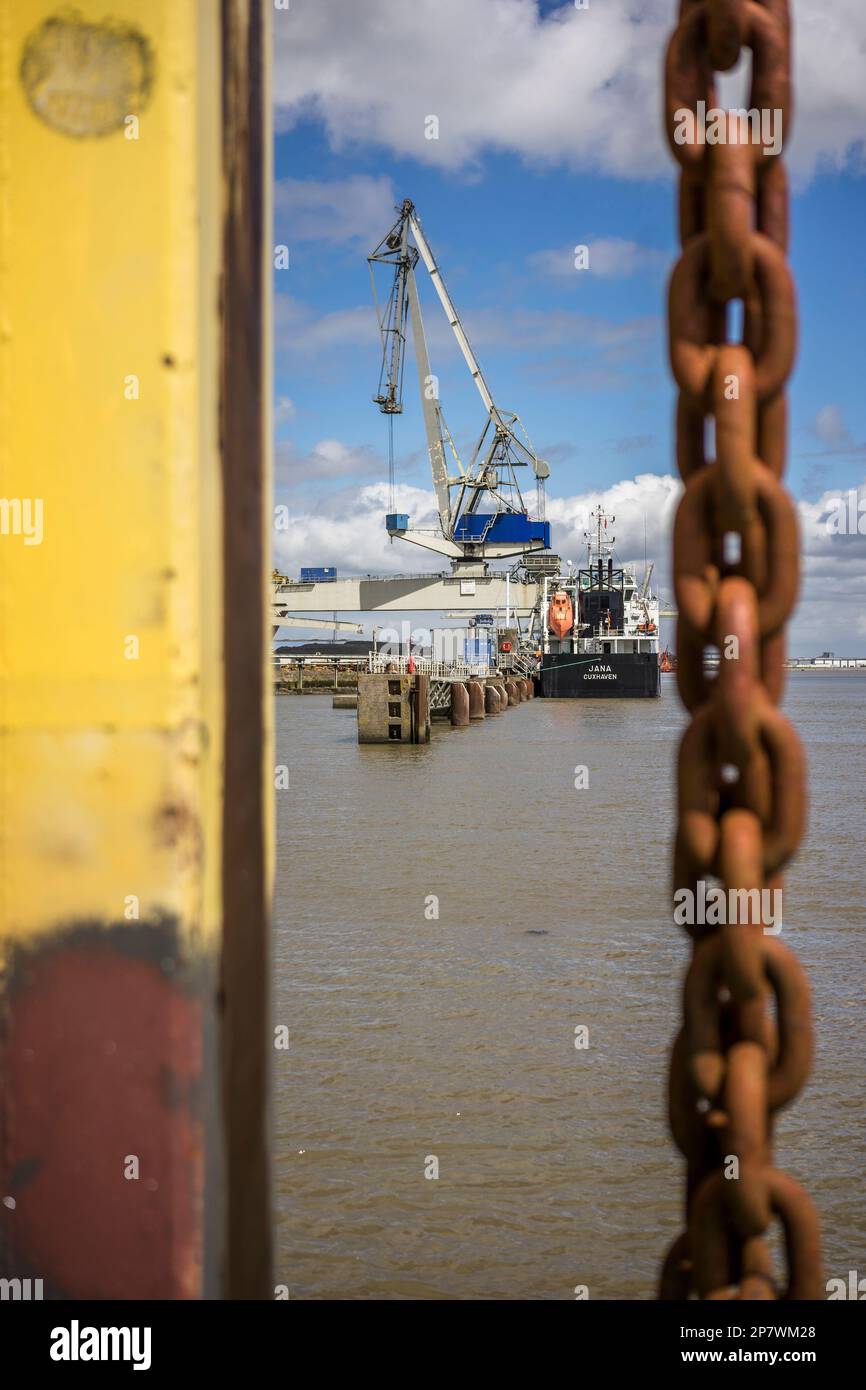 A cargo ship is docked in the port of Nordenham, Germany 2022. Stock Photo