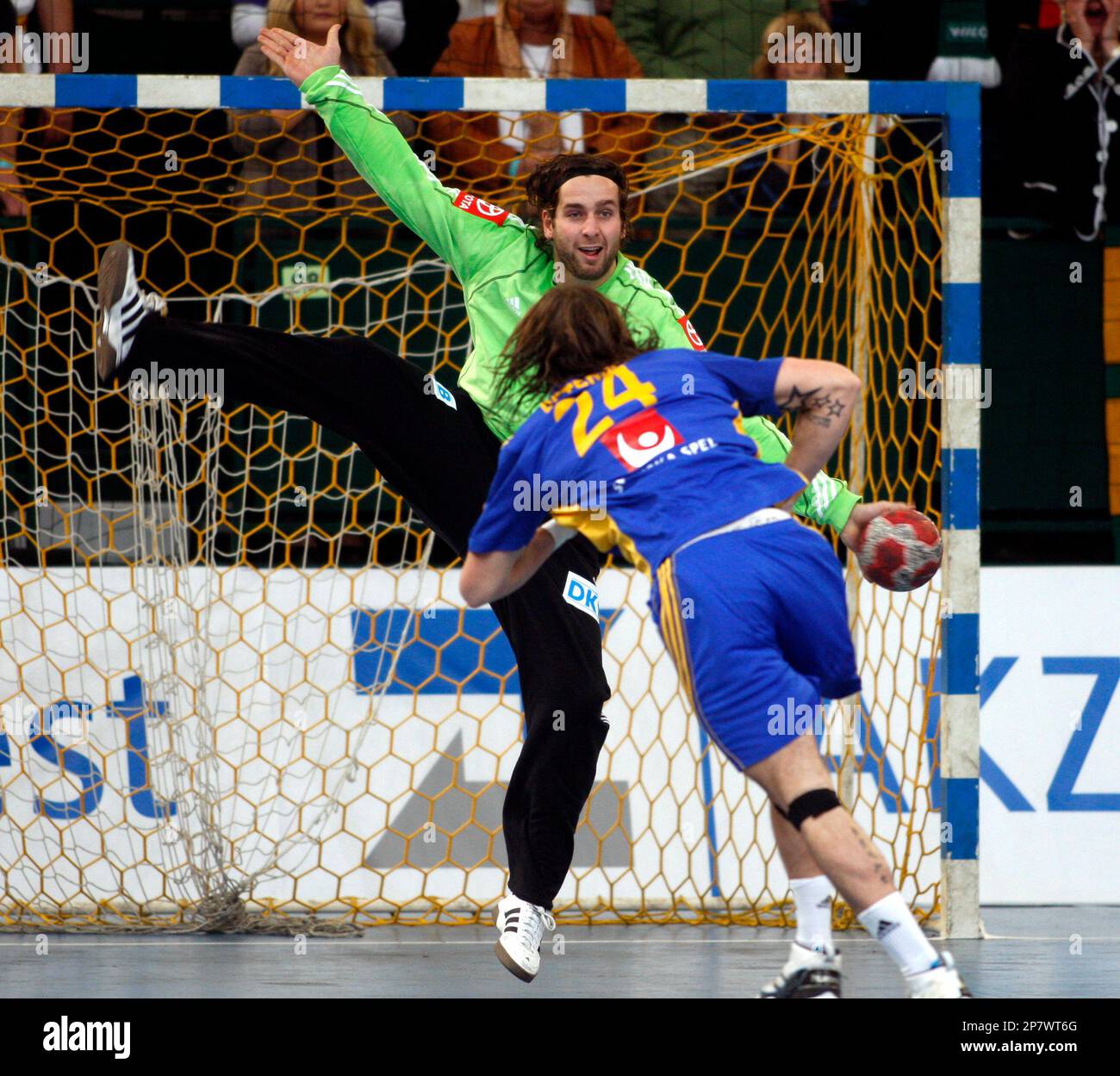 Germany's goalkeeper Silvio Heinevetter holds a seven meter throw from