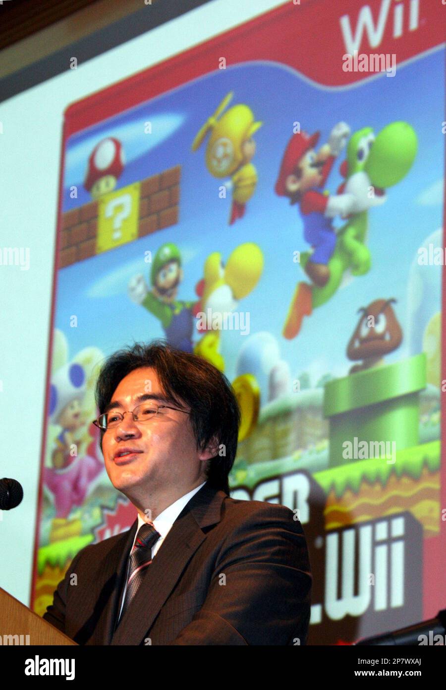 Nintendo President Satoru Iwata speaks as he unveils a Nintendo