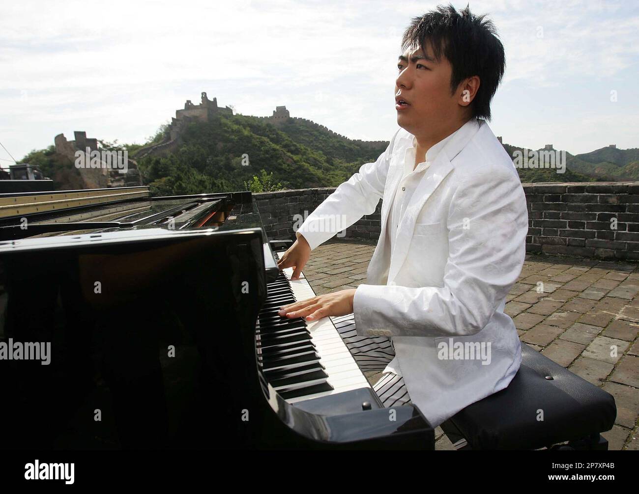 Chinese pianist Lang Lang performs music during the shooting of