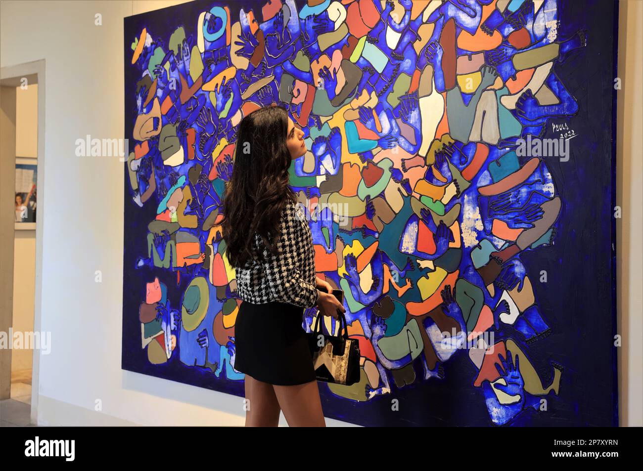 Beirut, Lebanon. 8th Mar, 2023. A visitor attends an art exhibition at