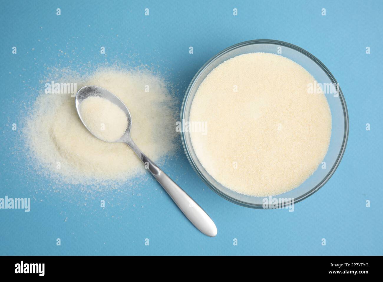 Gelatin powder on light blue background, flat lay Stock Photo Alamy