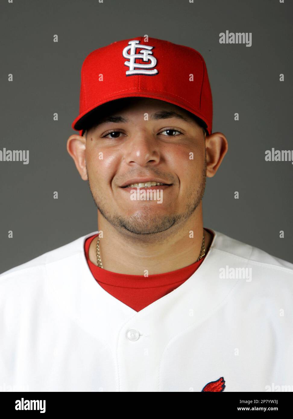 FILE -- This is a 2009 file photo showing St. Louis Cardinals baseball  player Yadier Molina. A New York sports marketing firm has sued St. Louis  Cardinals catcher Yadier Molina, saying he