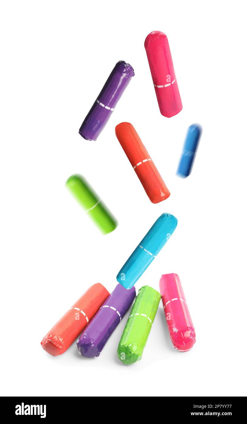Many tampons falling on white background. Menstrual hygienic product